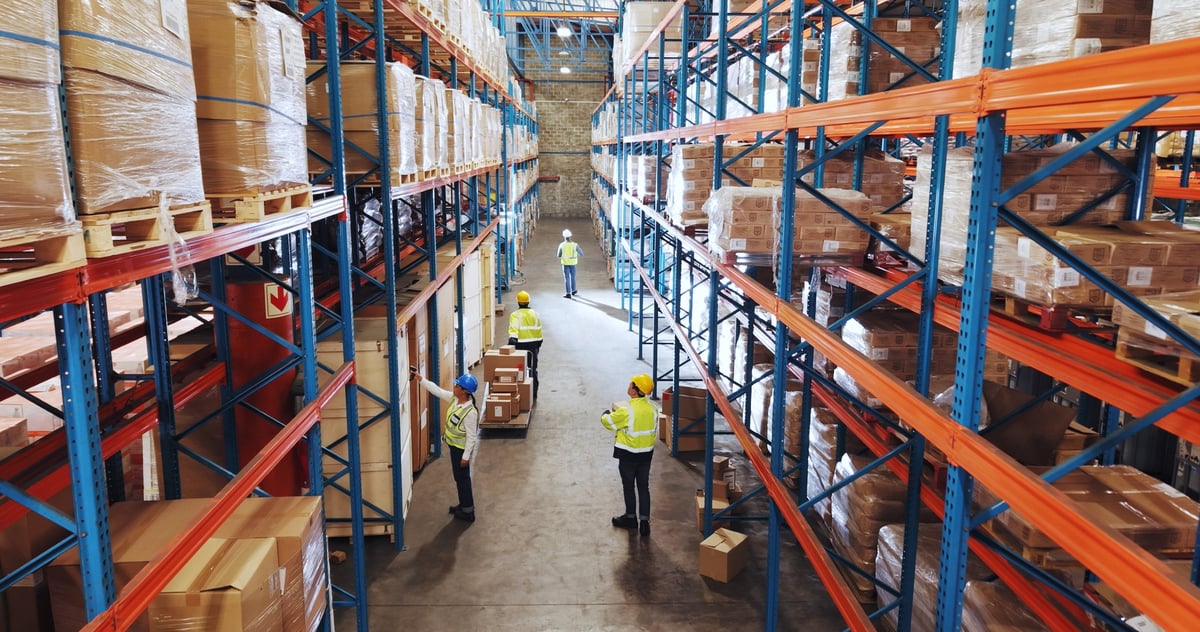 People, warehouse and above for logistics, boxes and inspection for packaging, shelf and safety check. Group, engineer and employees with stock, distribution and inventory management for supply chain